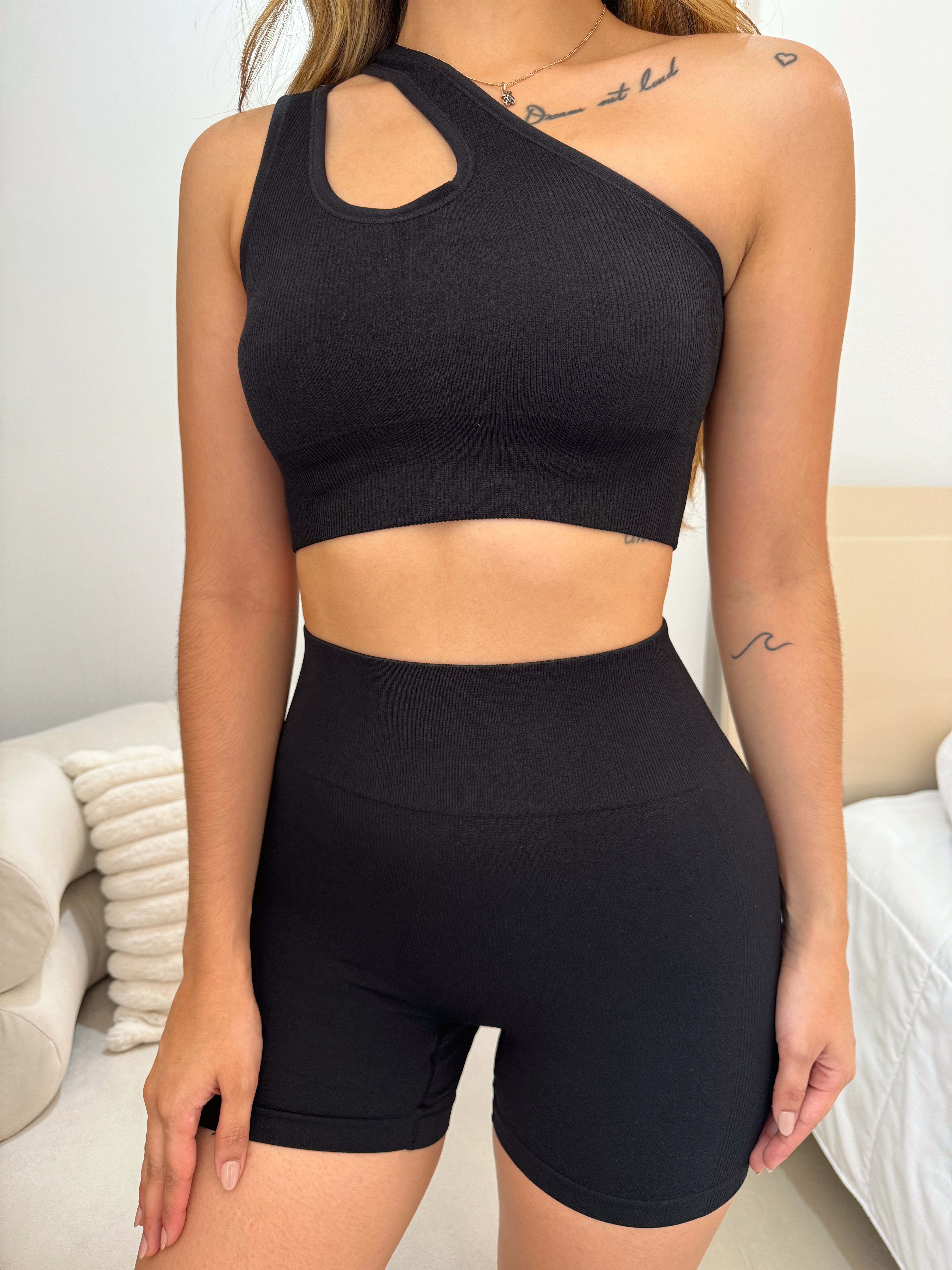 Set of striped crossed neckline and seamless biker top in black